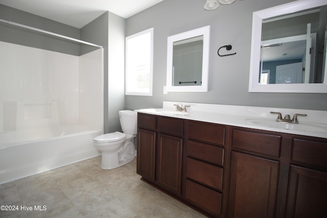 full bathroom featuring shower / tub combination, vanity, and toilet