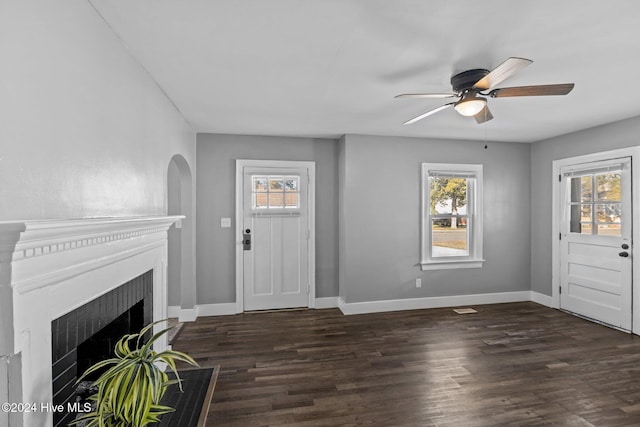 foyer featuring ceiling fan and dark hardwood / wood-style floors