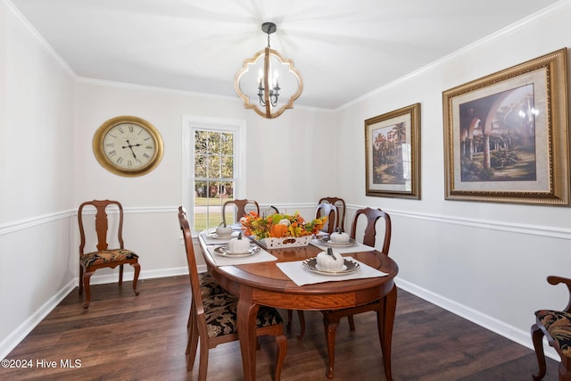 dining room featuring an inviting chandelier, ornamental molding, and dark hardwood / wood-style floors