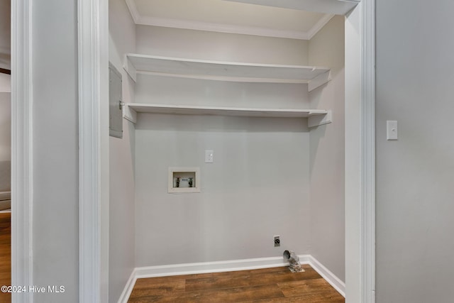 laundry room featuring ornamental molding, dark hardwood / wood-style floors, hookup for a washing machine, and electric dryer hookup