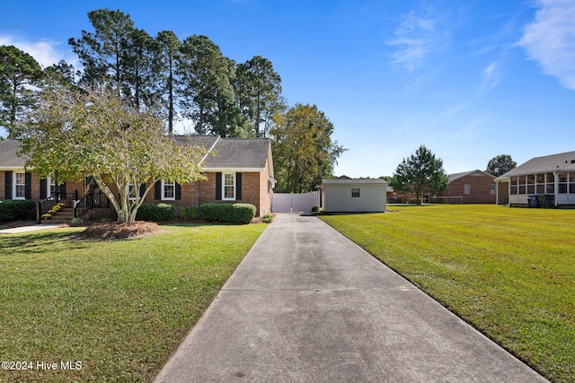 single story home with a front lawn