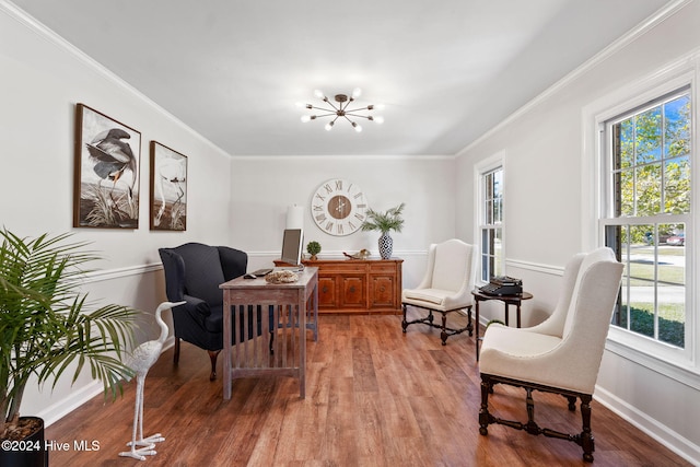 office with ornamental molding, hardwood / wood-style floors, and an inviting chandelier