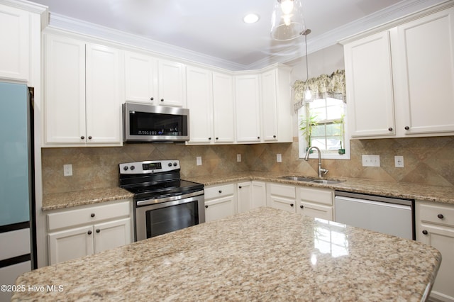 kitchen featuring white cabinetry, sink, and appliances with stainless steel finishes