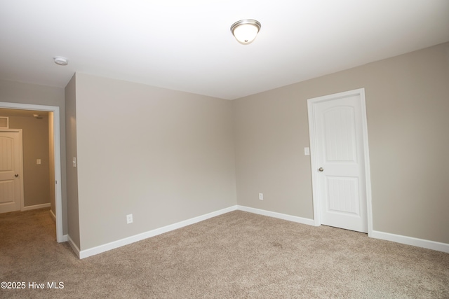 view of carpeted spare room