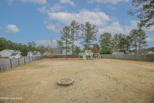 view of yard with a playground