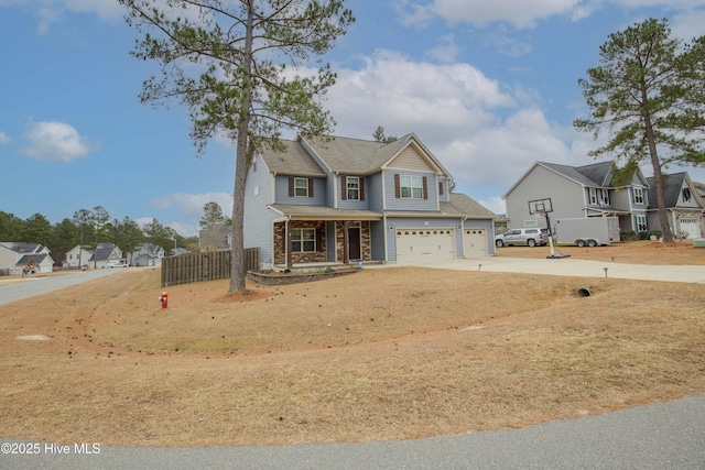 view of front of property with a porch and a garage