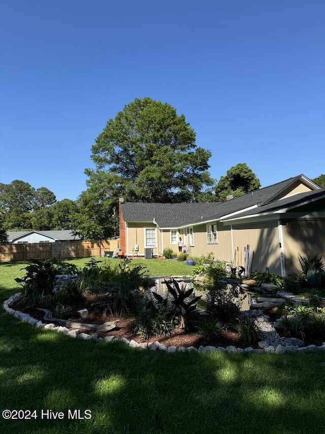 exterior space featuring a lawn