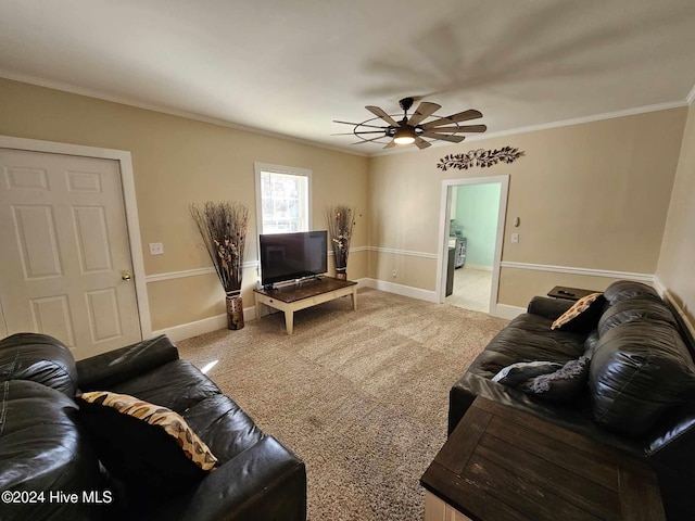 living room with ceiling fan, crown molding, and carpet flooring