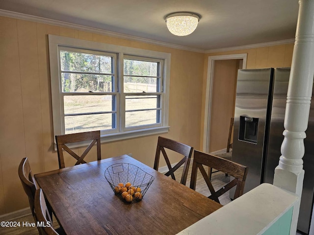 dining room with crown molding