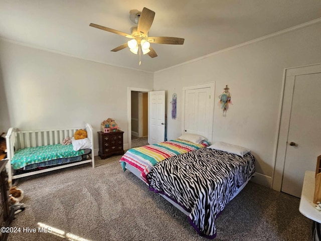 carpeted bedroom with ceiling fan and ornamental molding