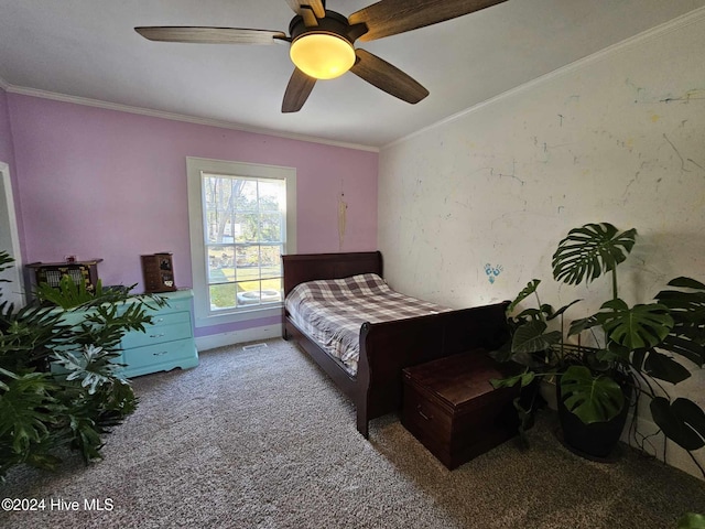 bedroom featuring carpet floors, ceiling fan, and crown molding