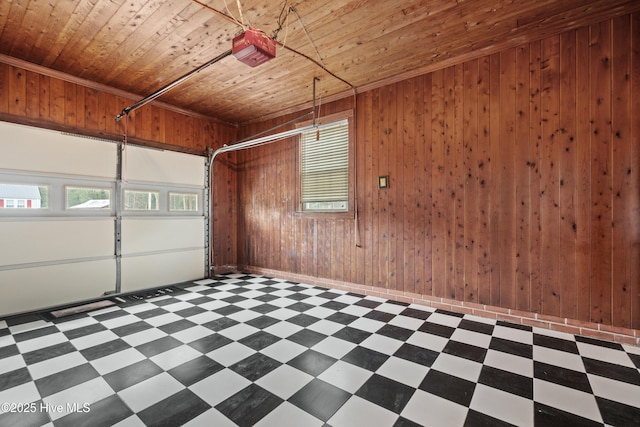 garage featuring a garage door opener, wood ceiling, and wooden walls