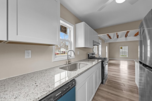 kitchen featuring a sink, light stone countertops, stainless steel appliances, white cabinetry, and beam ceiling