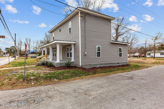 view of home's exterior with a porch