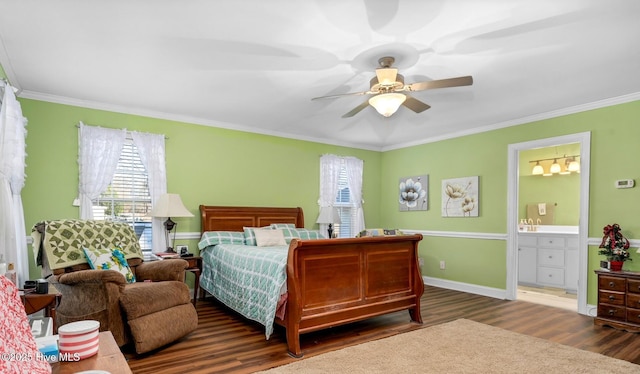 bedroom featuring ensuite bathroom, ceiling fan, dark hardwood / wood-style floors, and ornamental molding