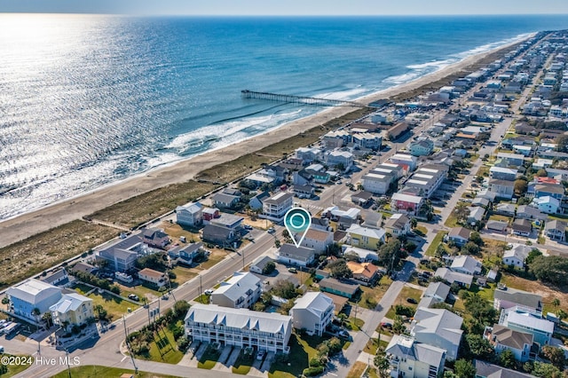 birds eye view of property with a residential view, a view of the beach, and a water view