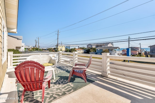 view of patio / terrace with a balcony