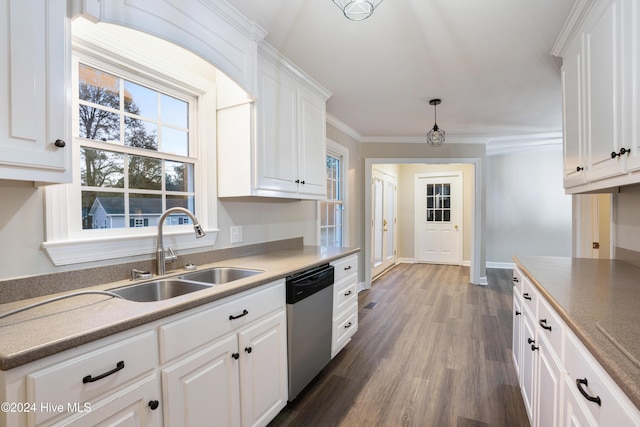 kitchen featuring sink, dark wood-type flooring, stainless steel dishwasher, crown molding, and white cabinets