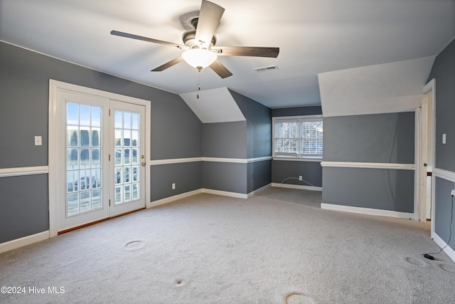 bonus room with carpet flooring, ceiling fan, and lofted ceiling