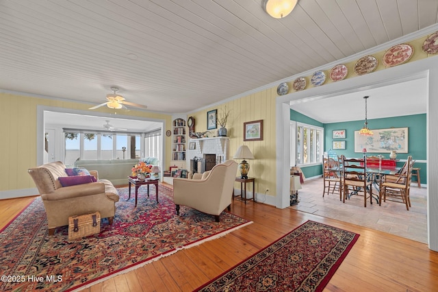 1339 Bayview Rd, Bath, NC 27808 - living room with healthy amount of natural light, hardwood / wood-style floors, crown molding, and ceiling fan