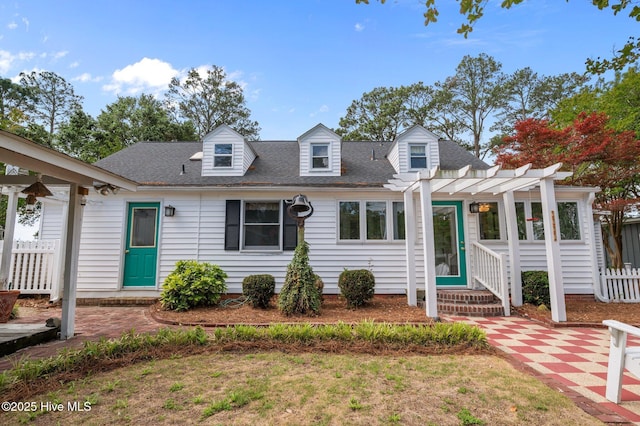 1339 Bayview Rd, Bath, NC 27808 - new england style home with a pergola, roof with shingles, entry steps, and a patio area