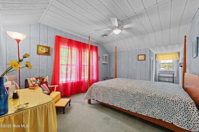 1339 Bayview Rd, Bath, NC 27808 - bedroom featuring vaulted ceiling, carpet, wood ceiling, a ceiling fan, and wood walls