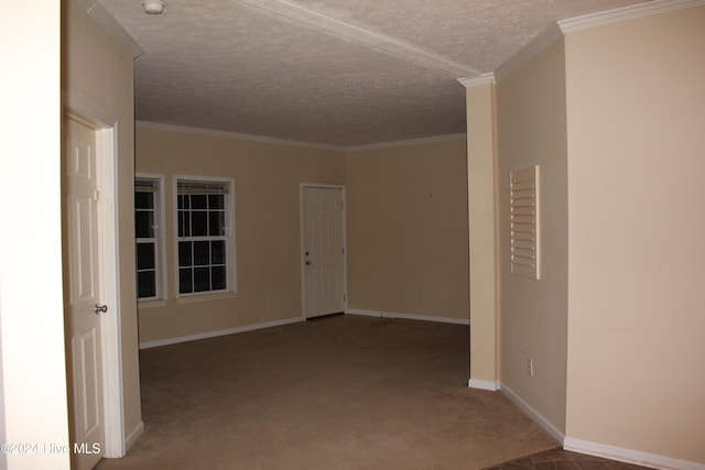 hall with carpet flooring, crown molding, and a textured ceiling