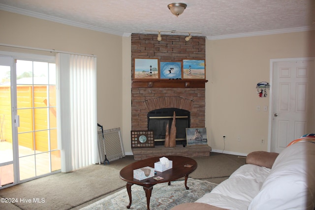 living room with a large fireplace, carpet floors, a textured ceiling, and ornamental molding