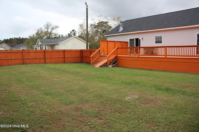 view of yard featuring a deck