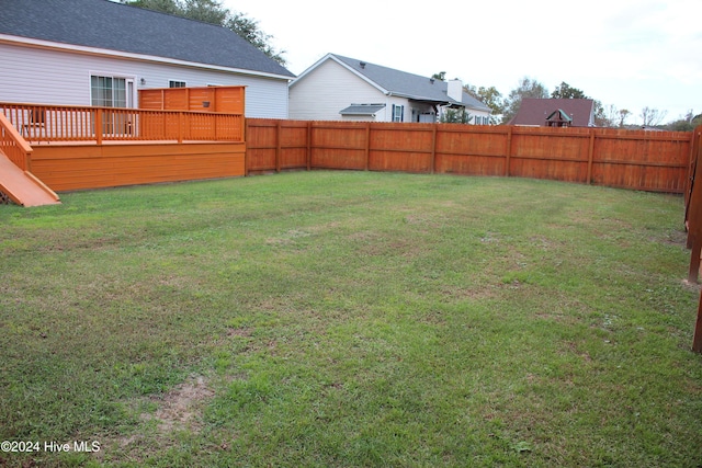 view of yard featuring a deck