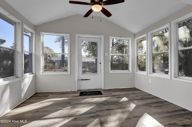 unfurnished sunroom featuring plenty of natural light, lofted ceiling, and ceiling fan