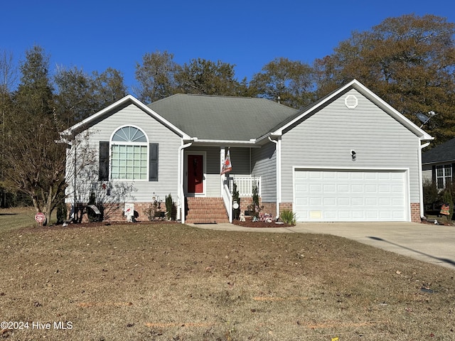 ranch-style house with a front lawn, a porch, and a garage