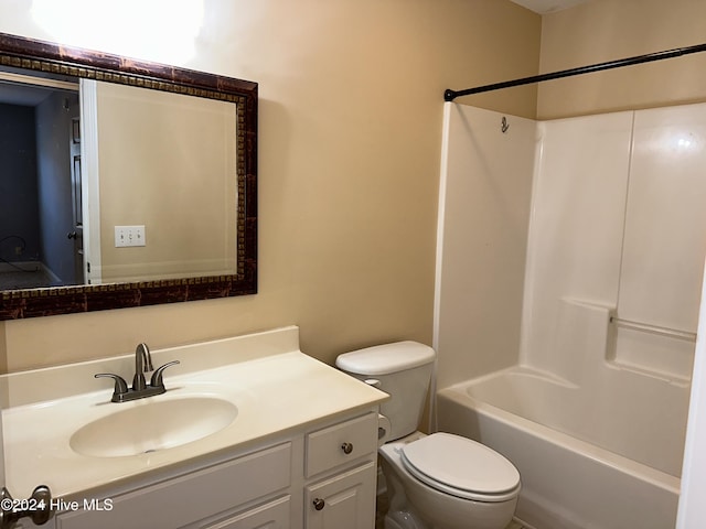 full bathroom with washtub / shower combination, vanity, and toilet