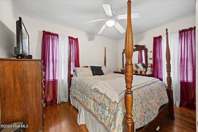 bedroom with hardwood / wood-style flooring and ceiling fan