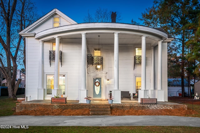 view of neoclassical / greek revival house