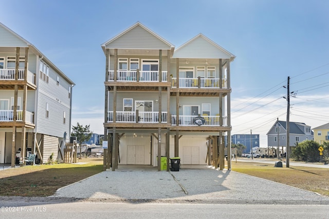 beach home with a balcony and a carport