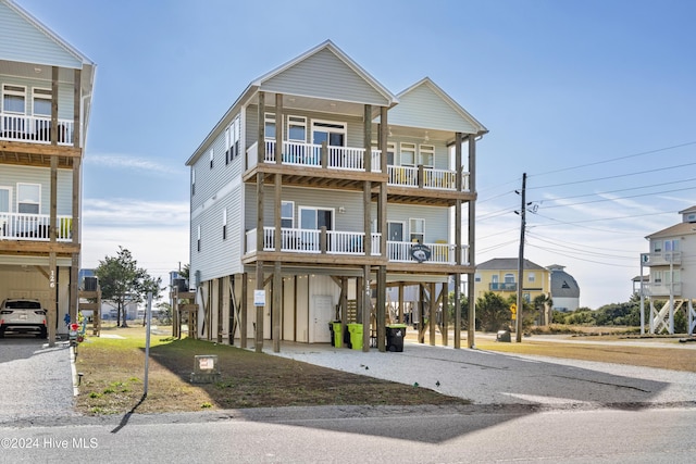 beach home featuring a carport