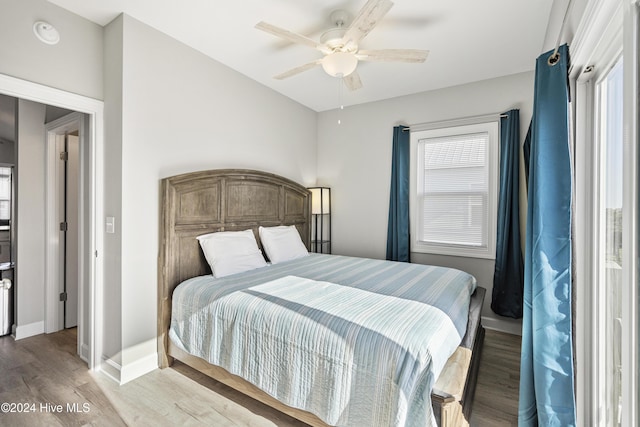 bedroom featuring ceiling fan and hardwood / wood-style flooring