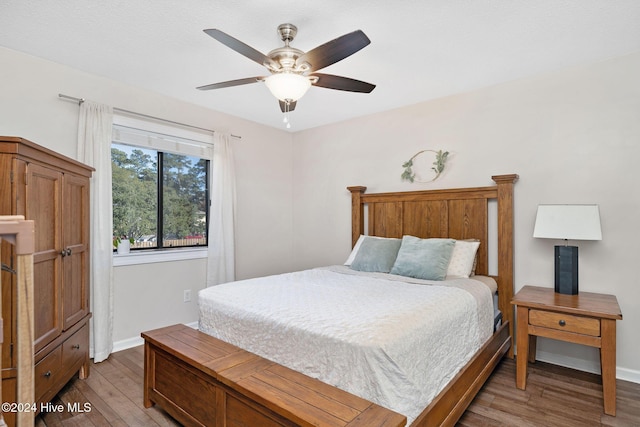 bedroom featuring light hardwood / wood-style flooring and ceiling fan