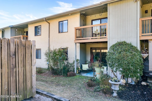 exterior space featuring a balcony