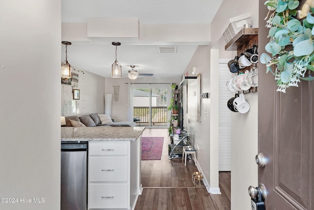 kitchen with stainless steel dishwasher, ceiling fan, dark wood-type flooring, decorative light fixtures, and white cabinetry