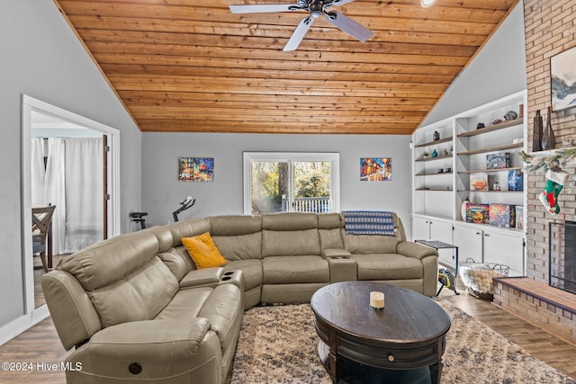 living room with ceiling fan, wooden ceiling, a brick fireplace, vaulted ceiling, and hardwood / wood-style flooring