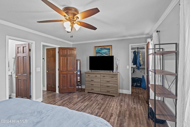 bedroom featuring a textured ceiling, dark hardwood / wood-style floors, ceiling fan, and ornamental molding