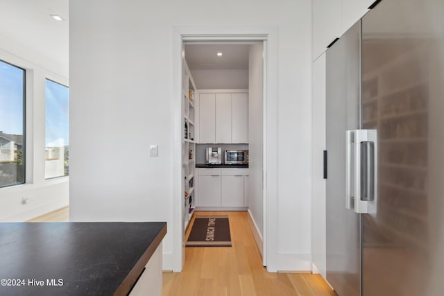 hallway featuring light hardwood / wood-style floors