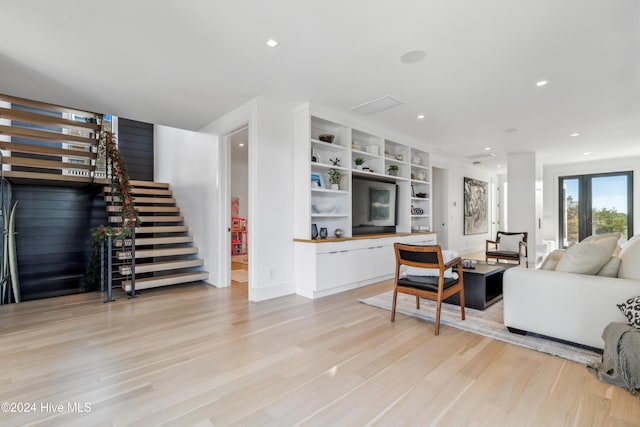 living room with light hardwood / wood-style floors