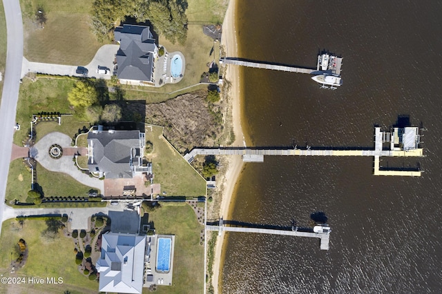 birds eye view of property featuring a water view