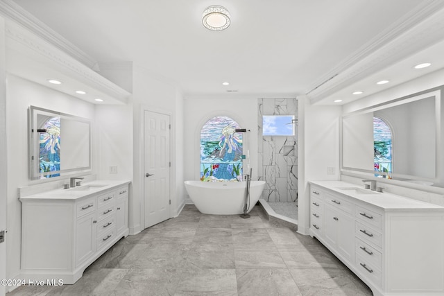 bathroom with vanity, ornamental molding, and shower with separate bathtub