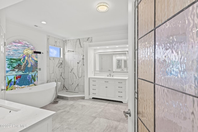 bathroom with ornamental molding, separate shower and tub, and vanity