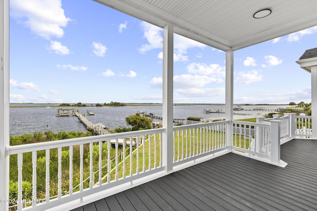 wooden terrace with a water view