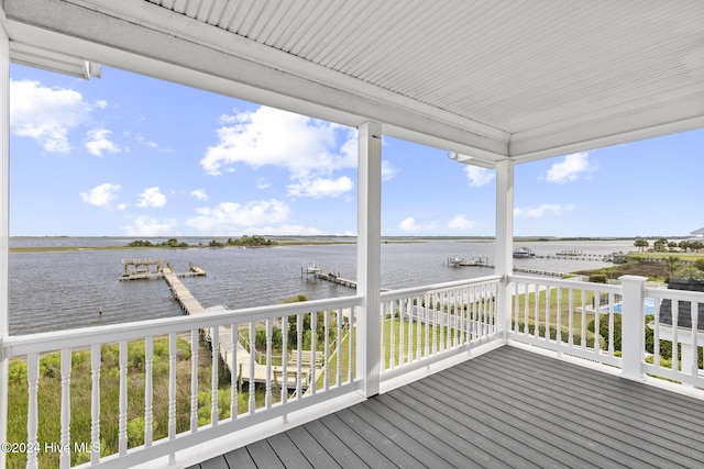 wooden terrace with a water view